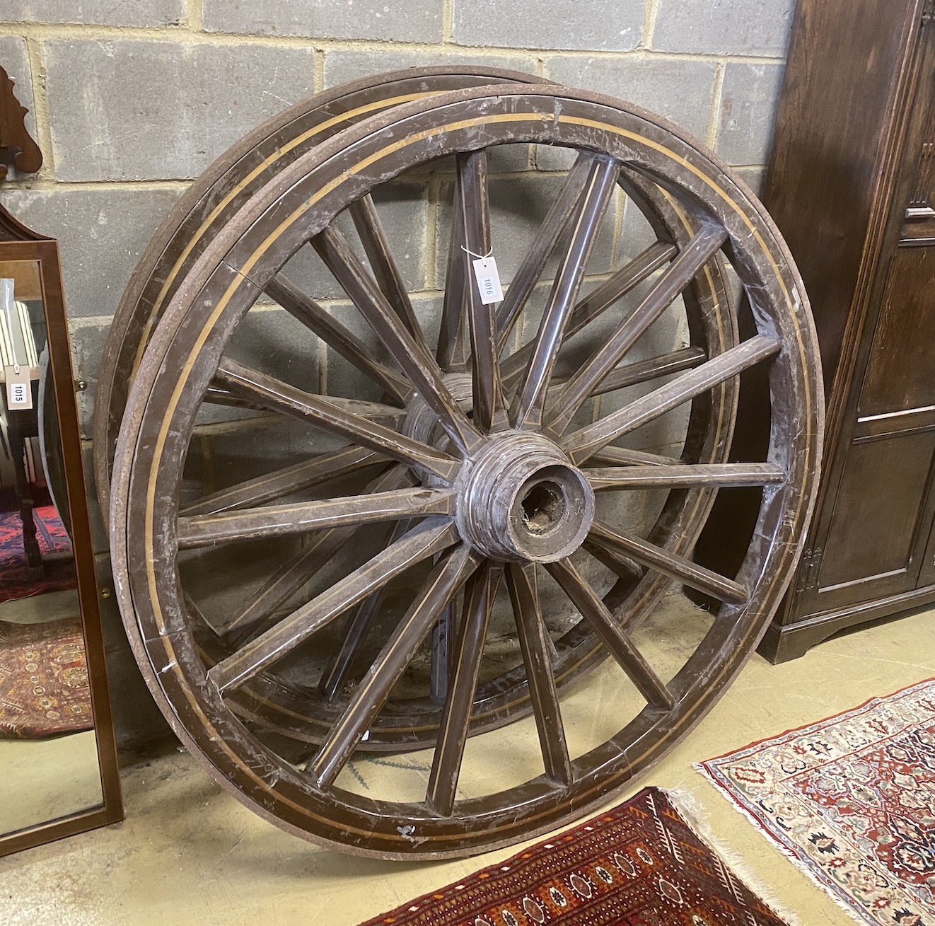 A pair of Victorian fire tender cart wheels, diameter 138cm